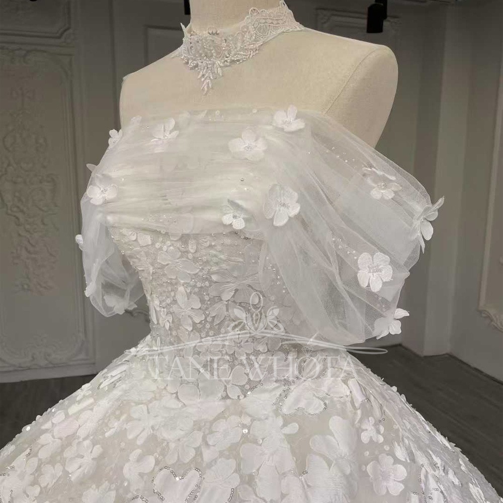 Luxe trouwjurk met lovertjes 2 - Embroidery Organza recensie en prijs